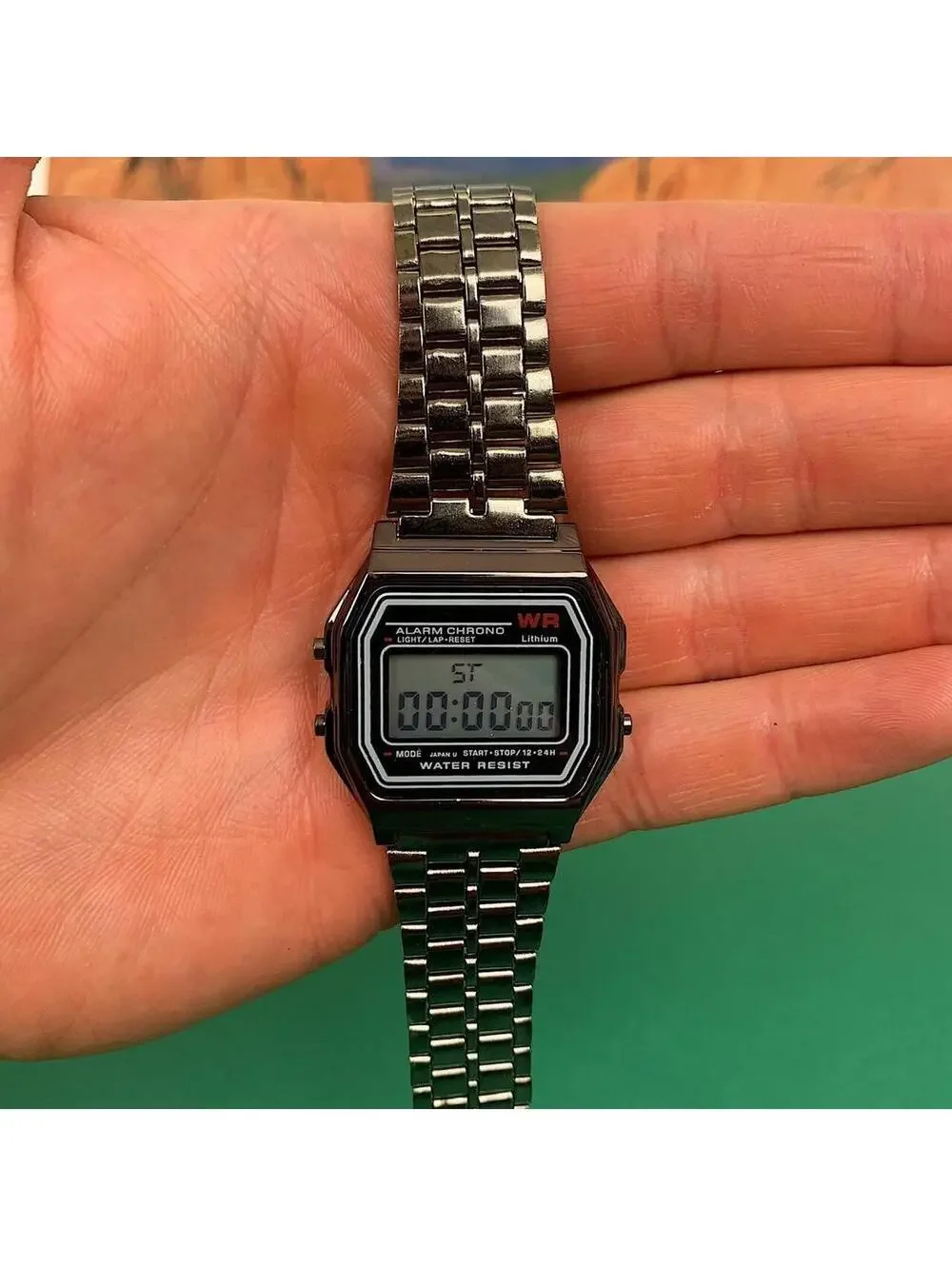 Y2k 2000s style cyber silver stainless steel digital watch. Has adjustable
